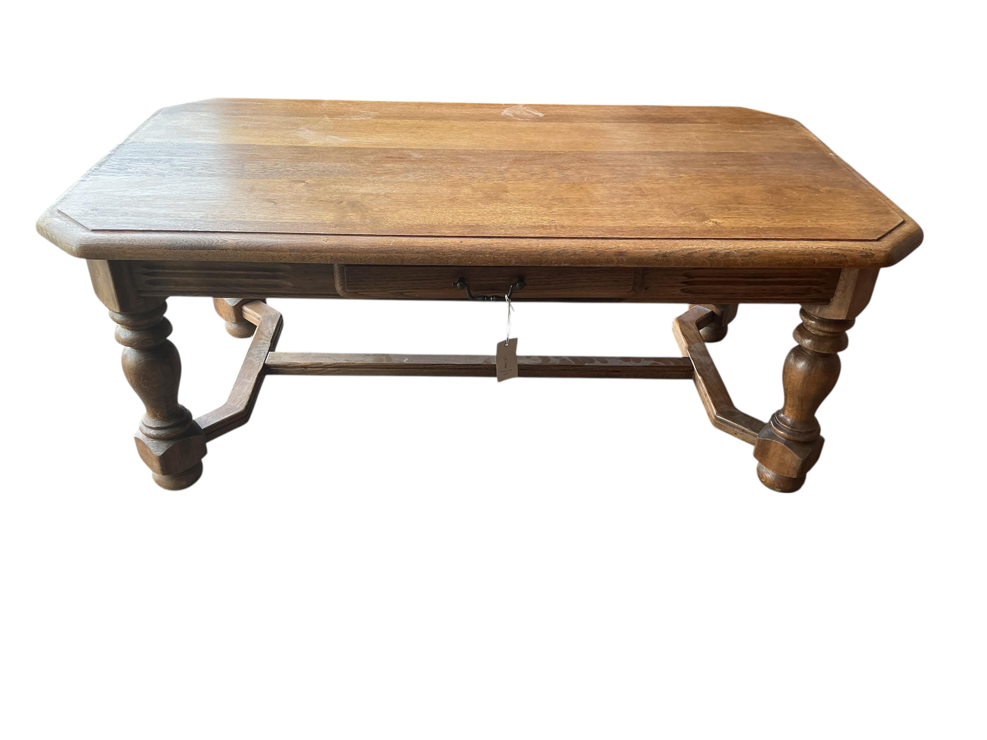 A rectangular oak coffee table, width 120cm, depth 70cm, height 47cm